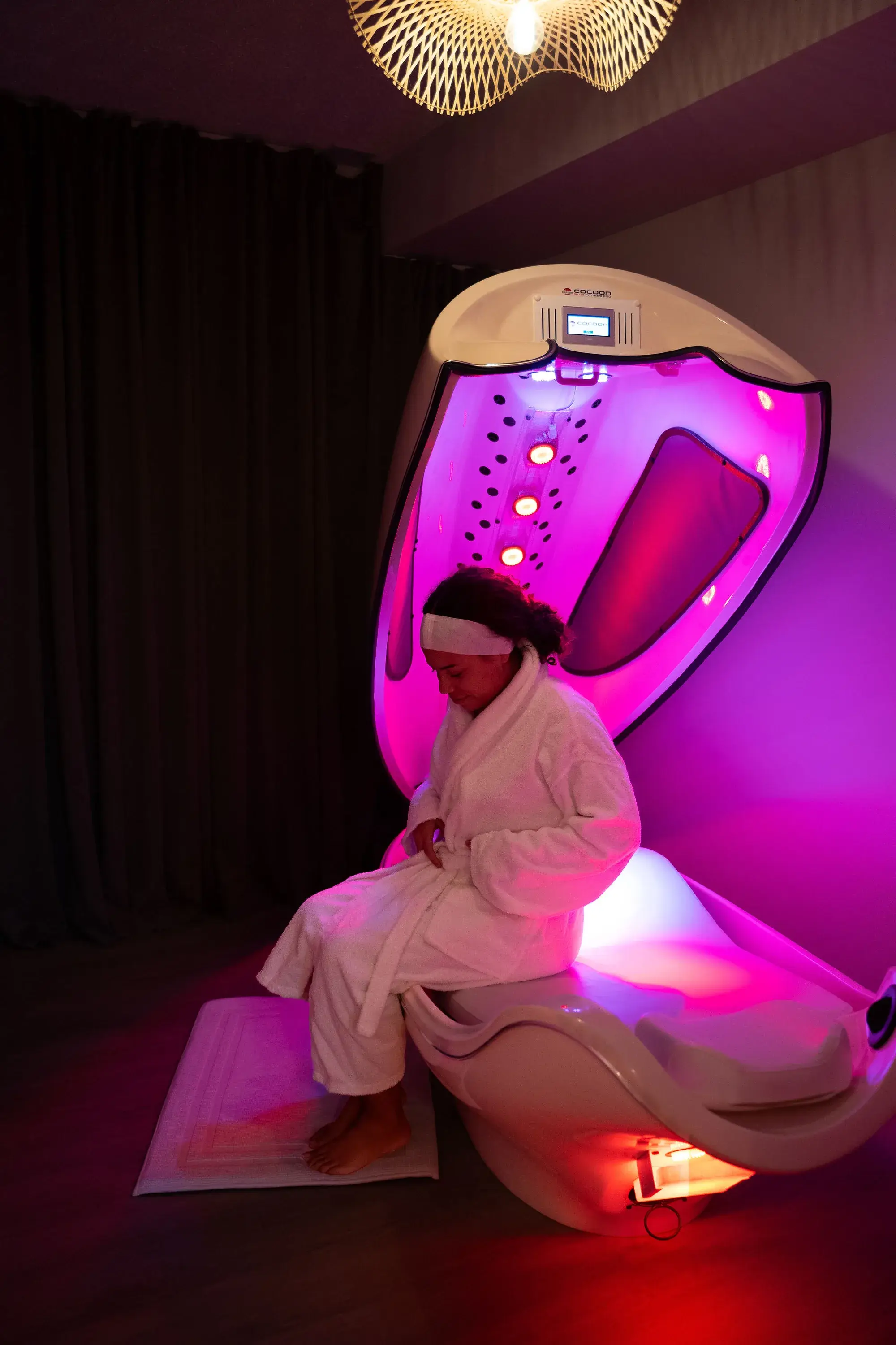 The infrared cocoon pod room with low, warm lighting